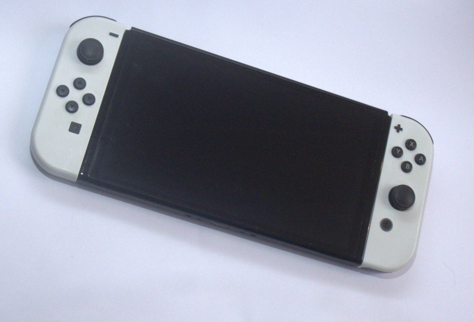 Weiße Nintendo Switch OLED aus dem Bestand von Koller Handel